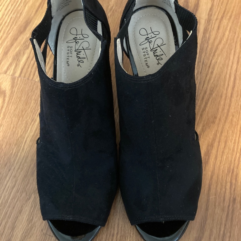 Women’s black, faux suede, heeled booties.